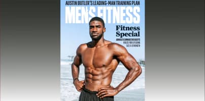 Cover of Men’s Fitness magazine featuring a muscular man posing on a beach, with the headline “Men’s Fitness Returns to Print With a Special Issue Magazine” and source label “Men’s Fitness.”
